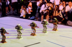 Contestants remote control their robots as they take part in China's 10th National Robot Competition in Beijing