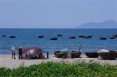 Fishermen on a beach near Da Nang