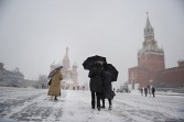People walk on Red Square in Moscow
