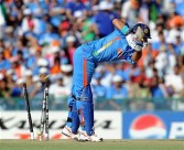 India batsman Yuvraj Singh gets clean bowled out by Pakistan bowler Wahab Riaz during the ICC Cricket World Cup 2011 semi-final match between India and Pakistan 