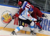 Finnish Jani Lajunen (white) fights for the puck with Russian Yevgeny Biryukov during their LG Hockey Games match in Moscow on February 10, 2011, 