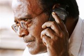 Indian mango grower on the phone March 2011