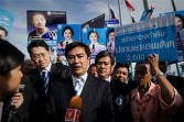 hai Prime Minister Abhisit Vejjajiva speaks to the media before the registration for parties competing in the upcoming general elections in Bangkok on May 19, 2011.
