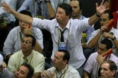 Stock traders negotiate in the iBovespa future index pit during the morning session at the Mercantile and Futures Exchange (BM&F) in Sao Paulo, Brazil, on May 7, 2009.
