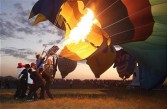 Contestants prepare their hot air balloons during an international hot air balloon festival in Baotou, north China's Inner Mongolia region on August 13, 2009