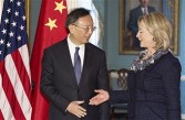 Chinese Foreign Minister Yang Jiechi (L) and US Secretary of State Hillary Clinton shake hands at the US Department of State on January 5, 2011 in Washington, DC.