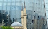 Baku old and new, a mosque in front of the fire towers June 2011