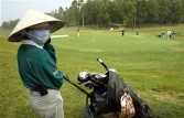 Vietnamese golf caddy
