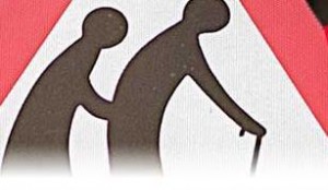 Old people crossing road hazard sign