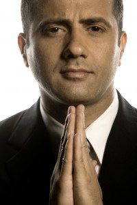 Man in suit praying