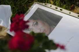 Flowers and a note are pictured on July Image of tributes to Amy Winehouse