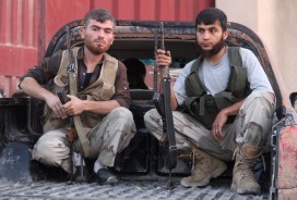 Fighters from Jabhat Fatah al-Sham in Aleppo where Syrian rebels have broken the siege by Assad regime forces
