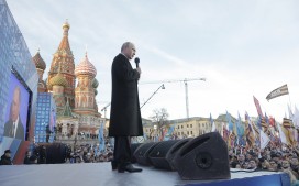 President Vladimir Putin addresses a rally in Moscow in March 2015 on the anniversary of his signing the annexation of Crimea