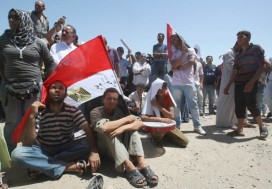 People follow the trial of Hosni Mubarak