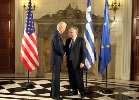 Greek prime minister Lucas Papademos, right, shakes hand with US vice president Joe Biden in Athens on Monday. Photo: Thanassis Stavrakis/AP